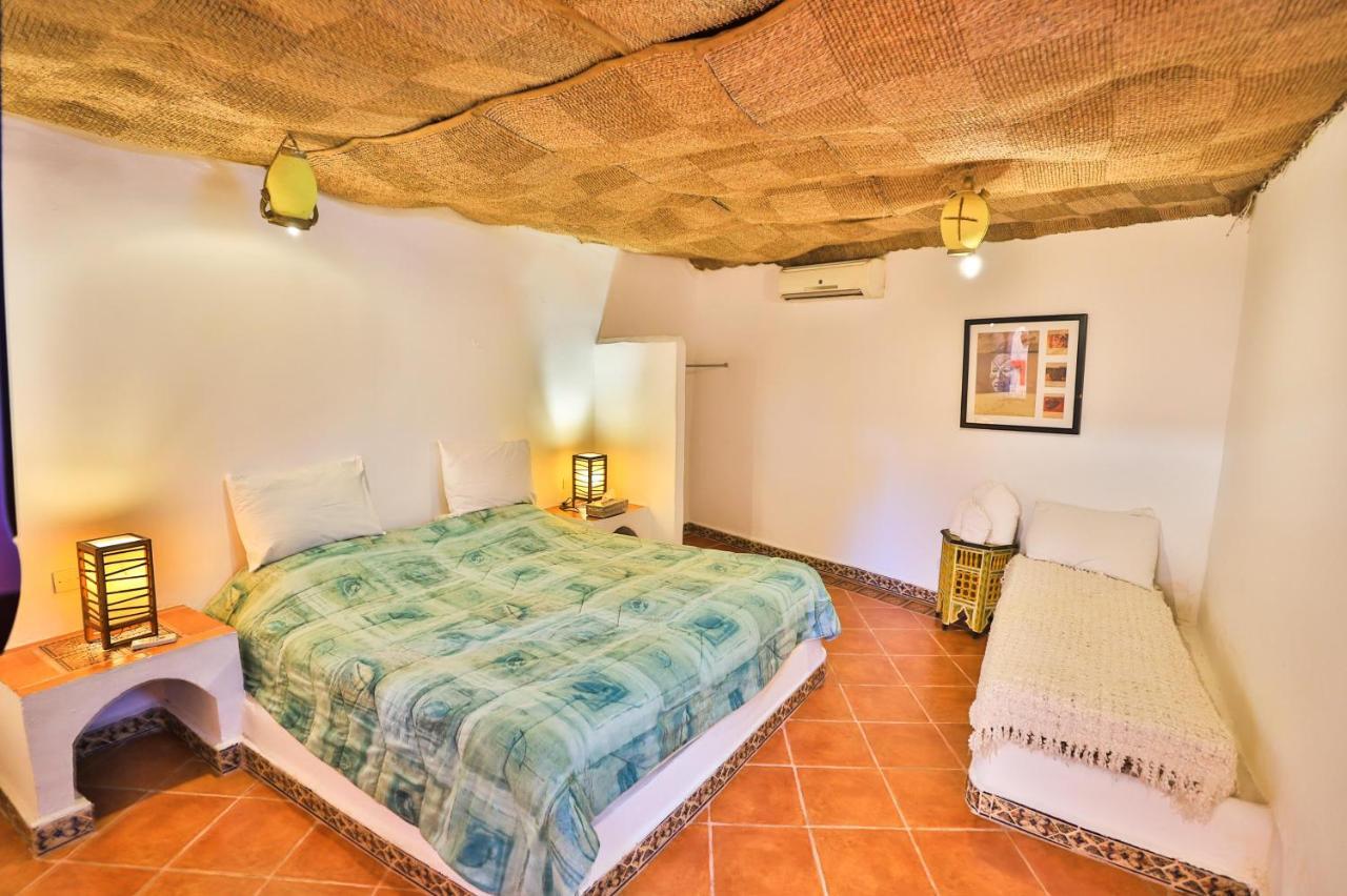 Riad Haj Palace & Spa Fes Ngoại thất bức ảnh A bedroom in a cave house